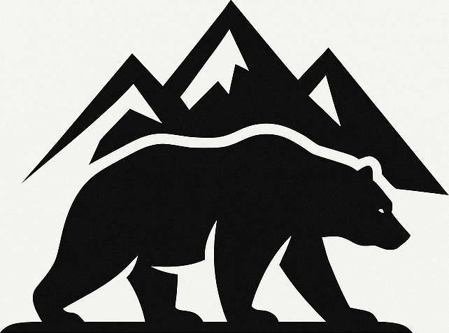 Bear in front of mountain range